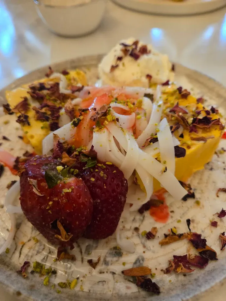 Smoky garlic wagyu burger and rosa beef bolognese pasta fusion plates at Ghazal Fine-Dine Edmonton